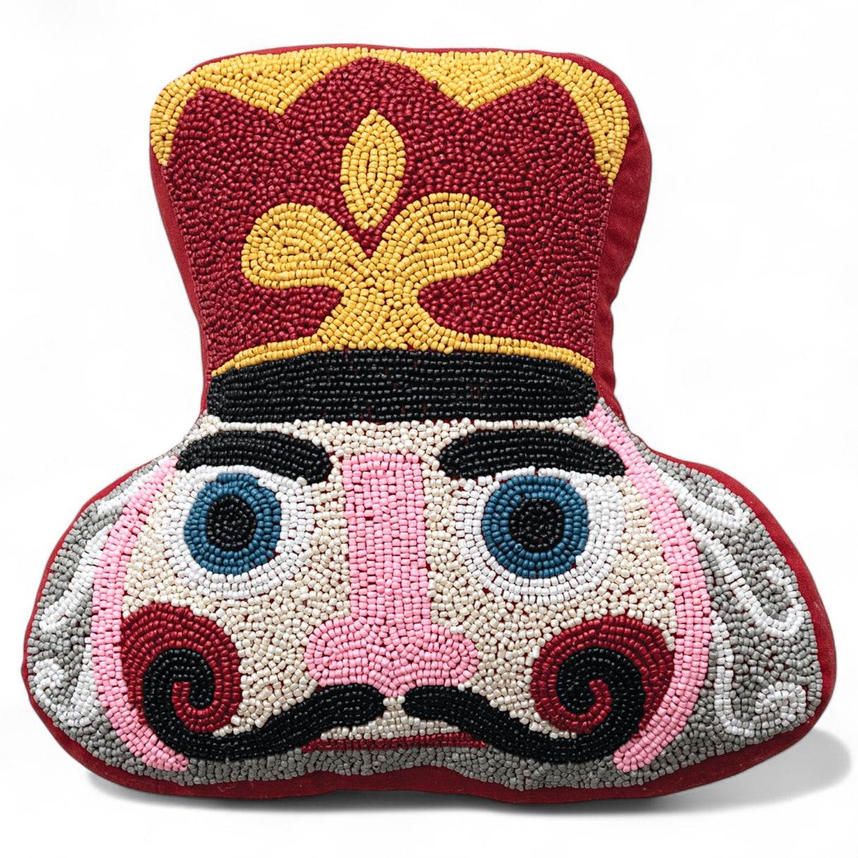 Nutcracker shaped cotton blend pillow with colorful beadwork