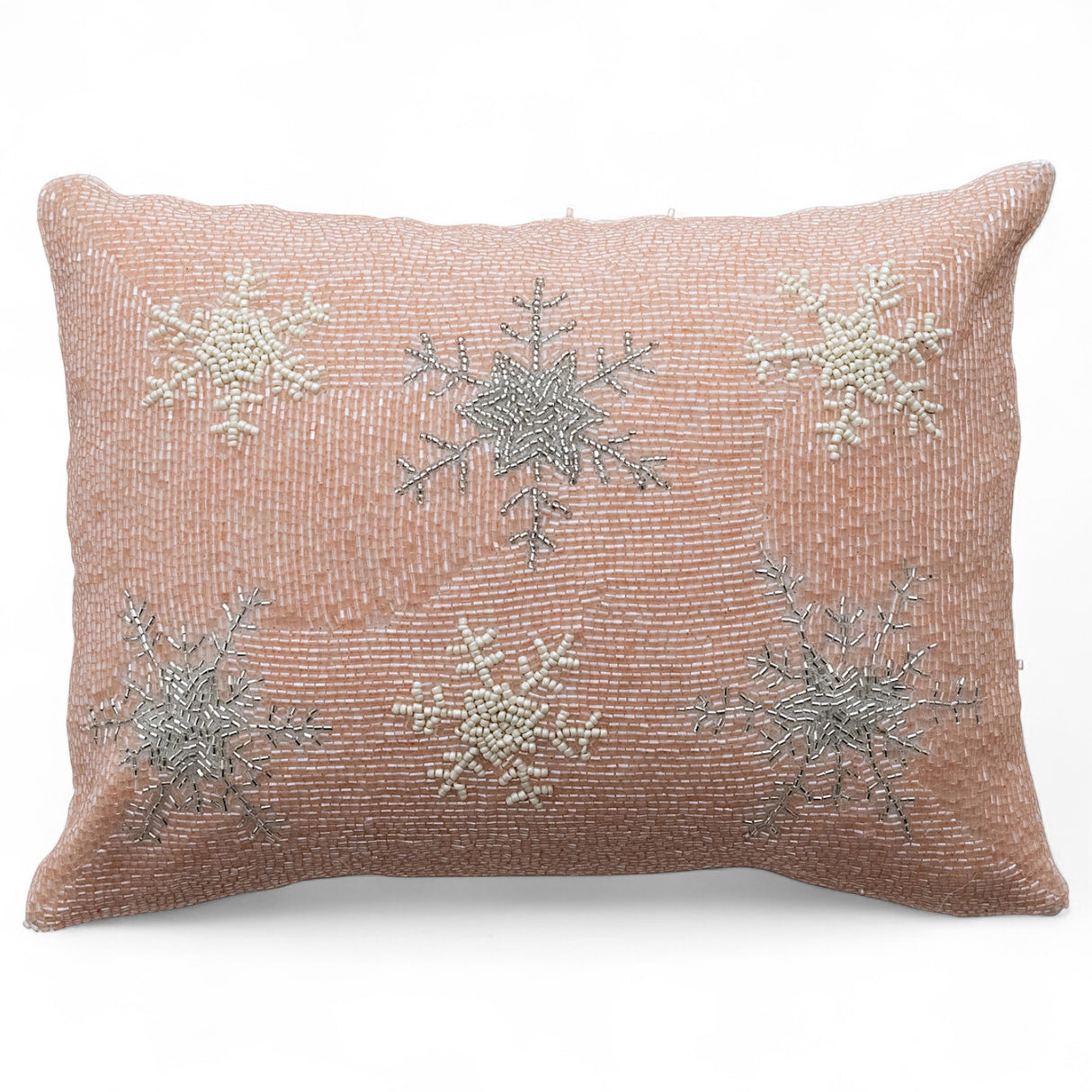 Pink cotton lumbar pillow with cream and silver beaded snowflakes