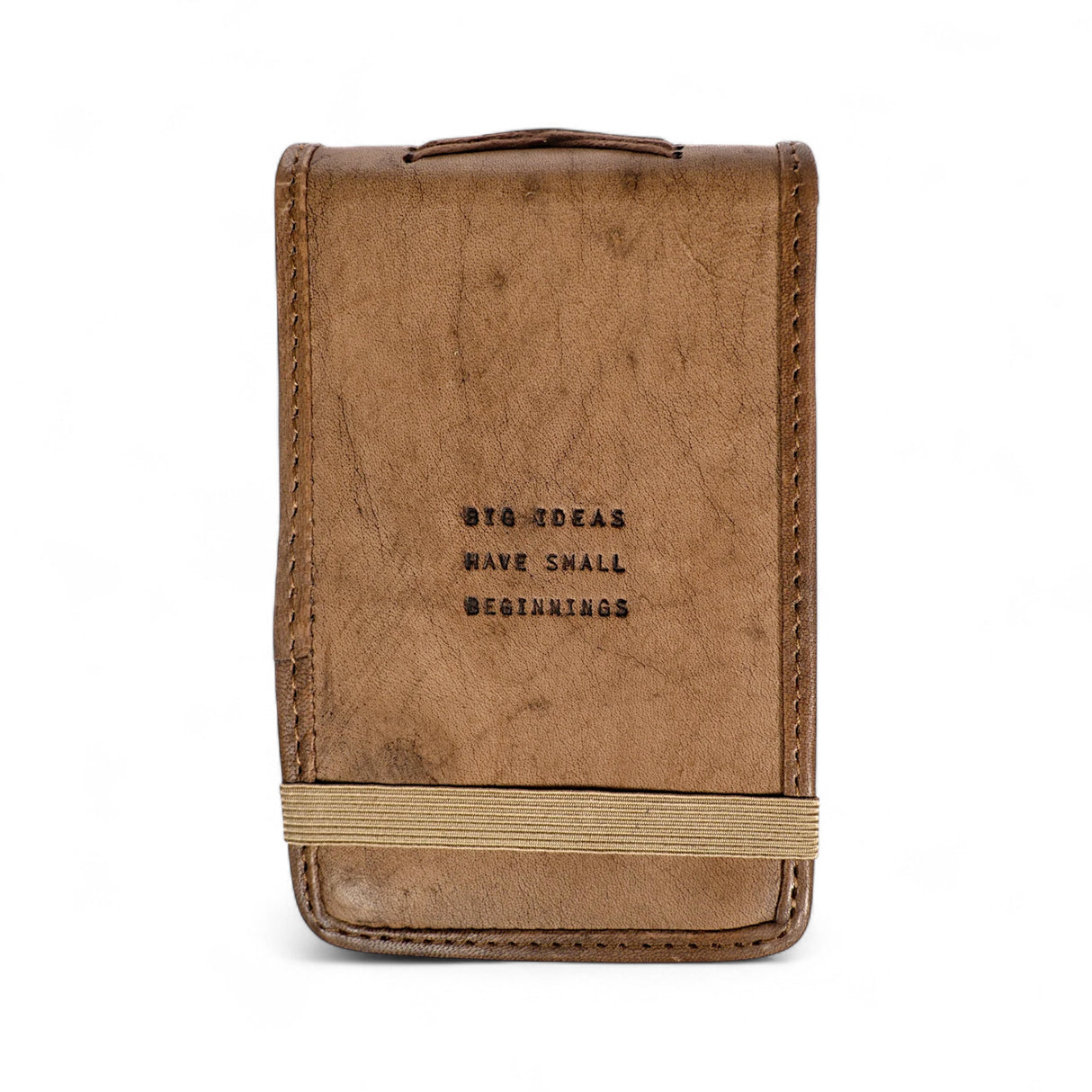 Brown leather notebook with 'Big ideas have small beginnings' text