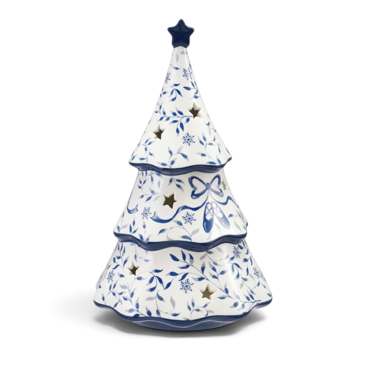 White ceramic LED Christmas tree with blue botanical designs, ballet slippers, star cutouts, scalloped tiers, and a blue star topper