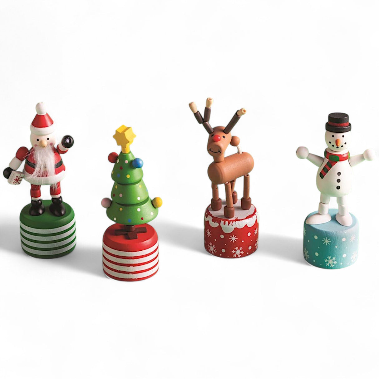 Collapsing wooden Christmas toys in four styles: Santa, tree, reindeer, snowman