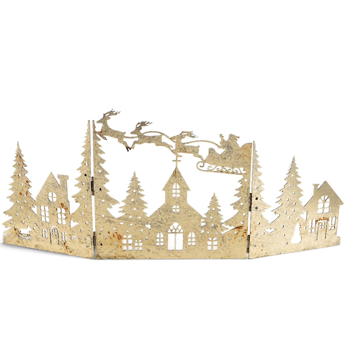 Distressed gold folding metal Christmas village with Santa, sleigh, and reindeer above houses and trees, styled with candles