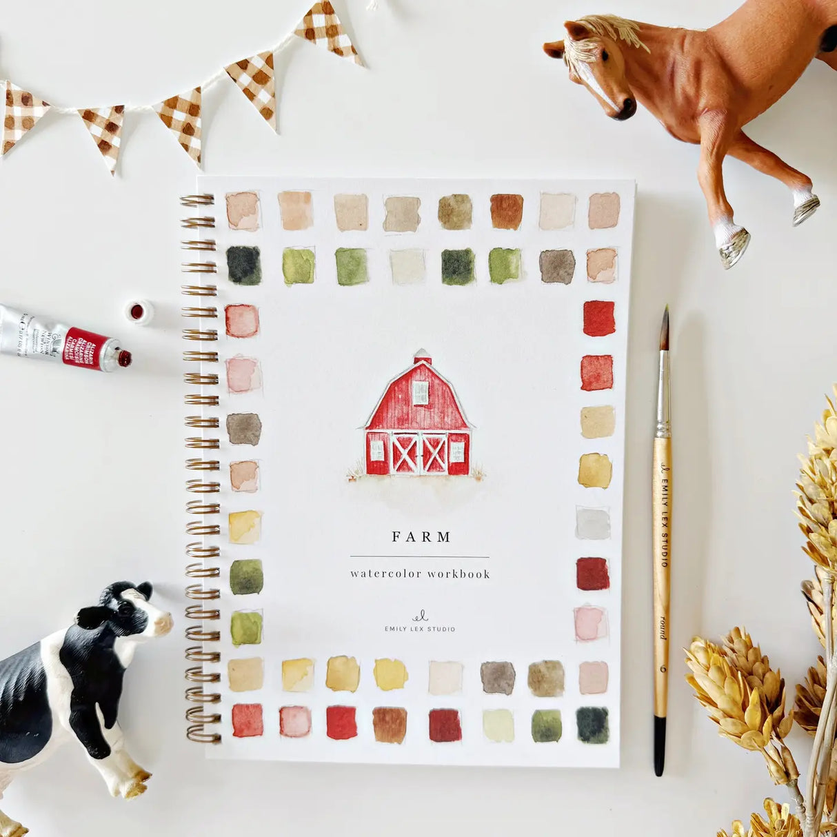 Farm watercolor workbook with red barn cover and paint swatch border