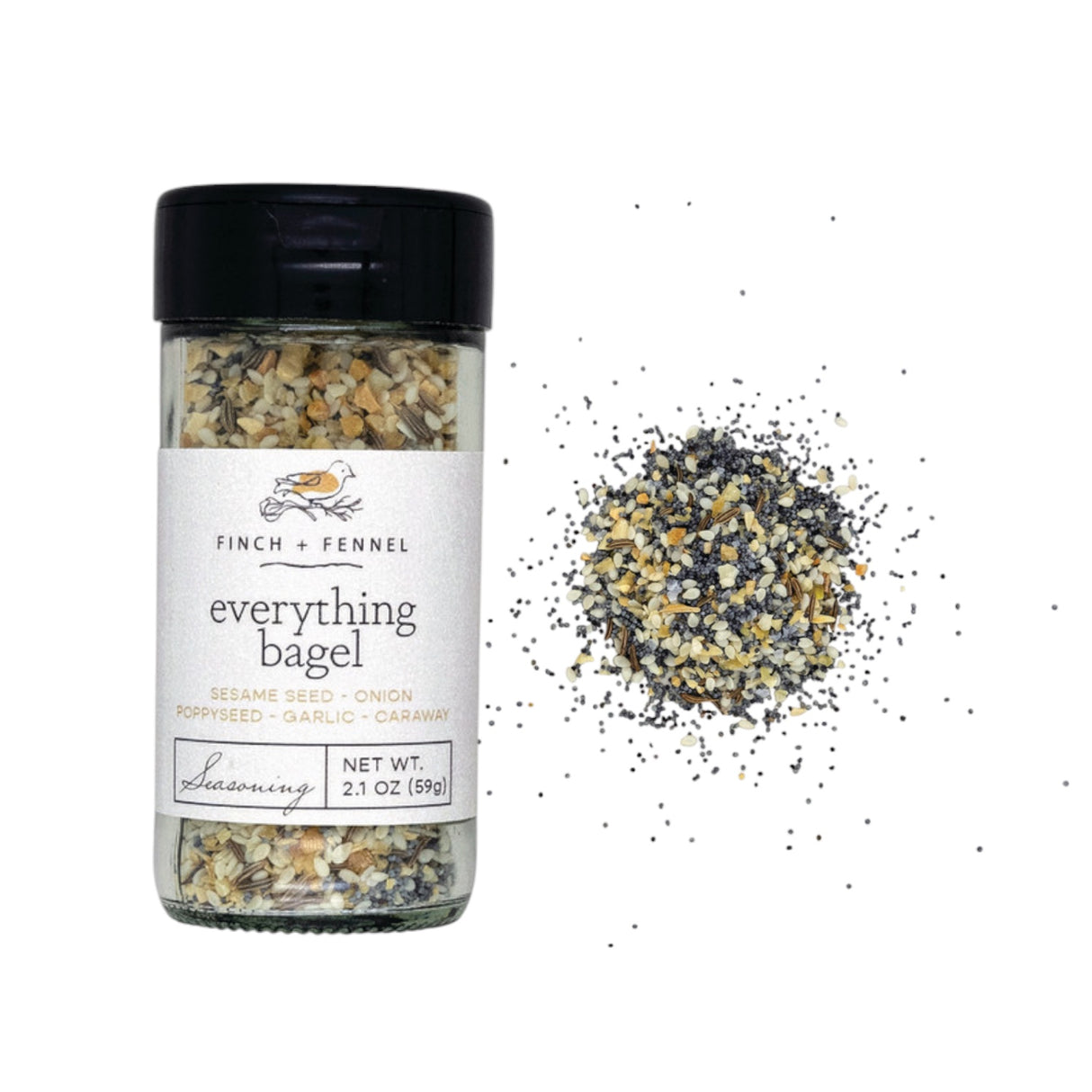 Finch + Fennel Everything Bagel Seasoning jar beside seasoning blend and toast sprinkled with seasoning