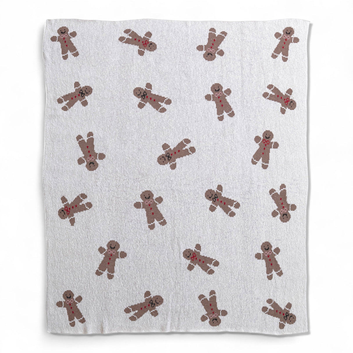 White cotton knit throw with gingerbread cookie pattern