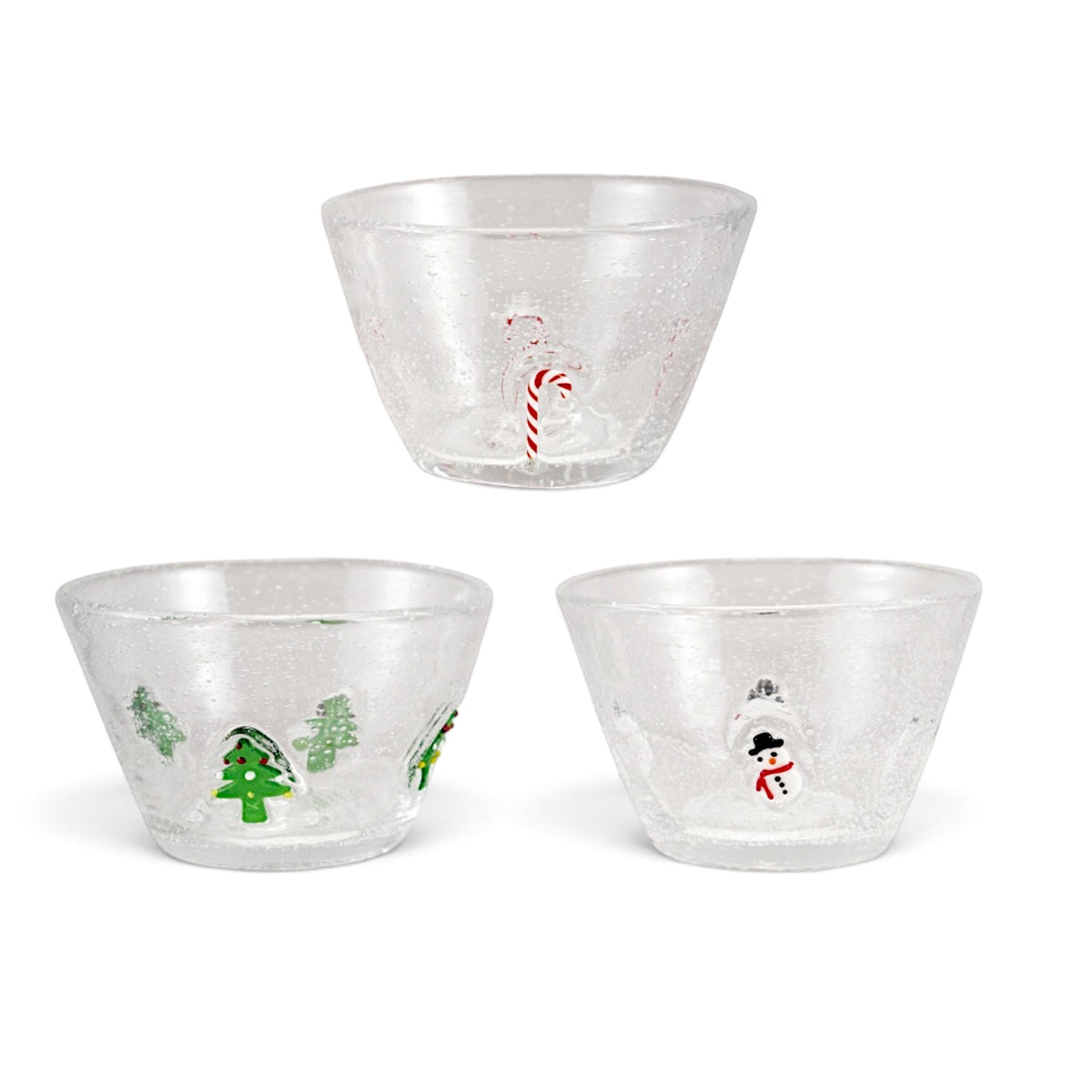 Three clear glass holiday bowls with bubbled details and embedded red candy canes, green Christmas trees, or snowmen