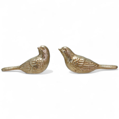 Two gold cast iron bird figurines in different styles