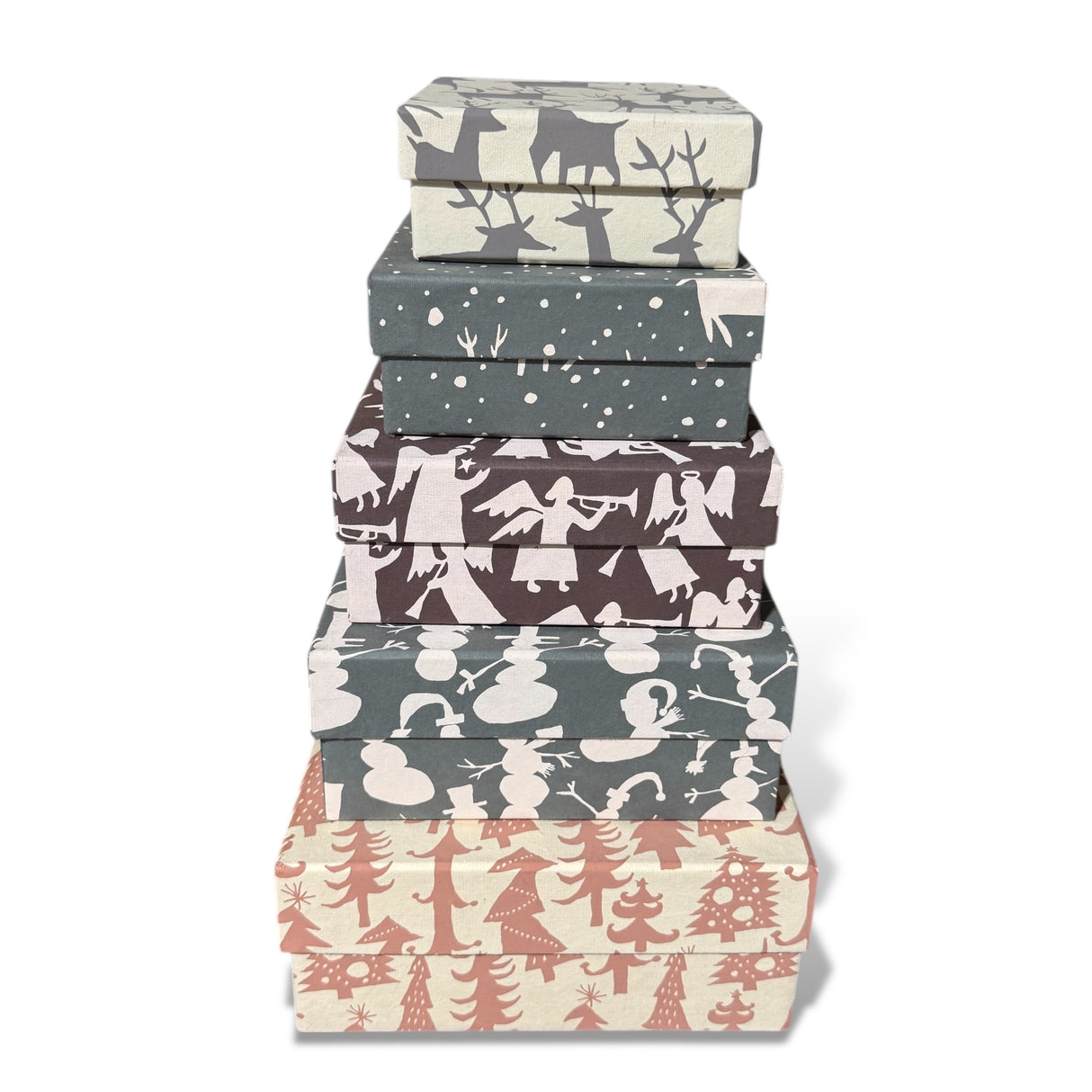 Stacked handmade holiday square gift boxes with festive recycled paper patterns