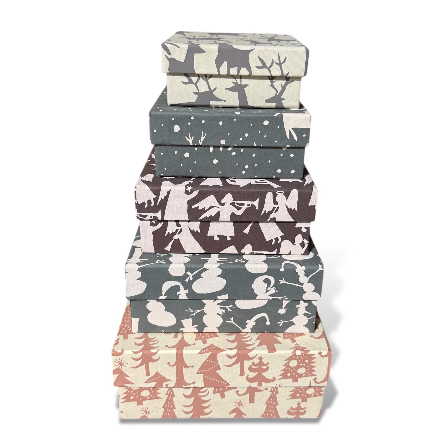 Stacked handmade holiday square gift boxes with festive recycled paper patterns