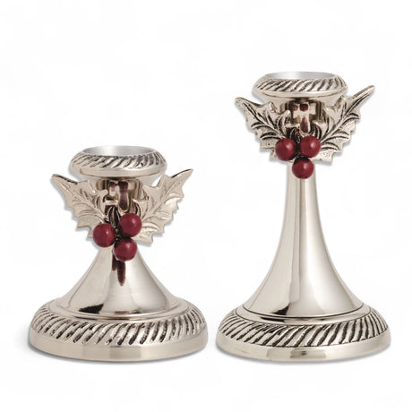 aluminum metal holly candlesticks with leaf and berry detail in two sizes