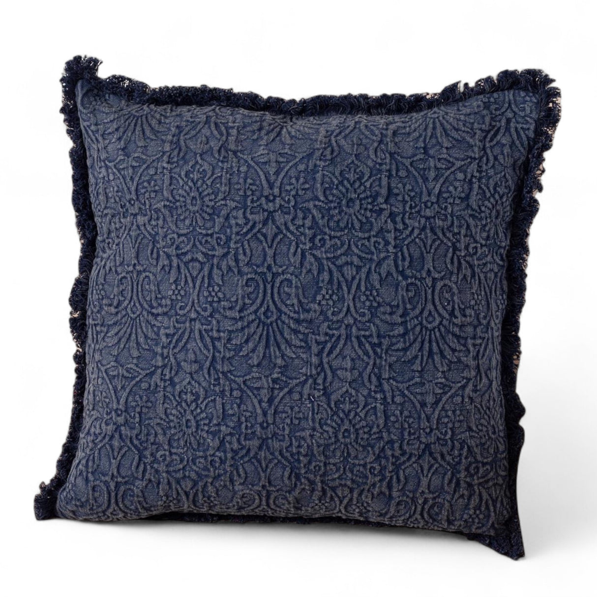 20-inch indigo blue pillow with woven medallion pattern and fringe edges