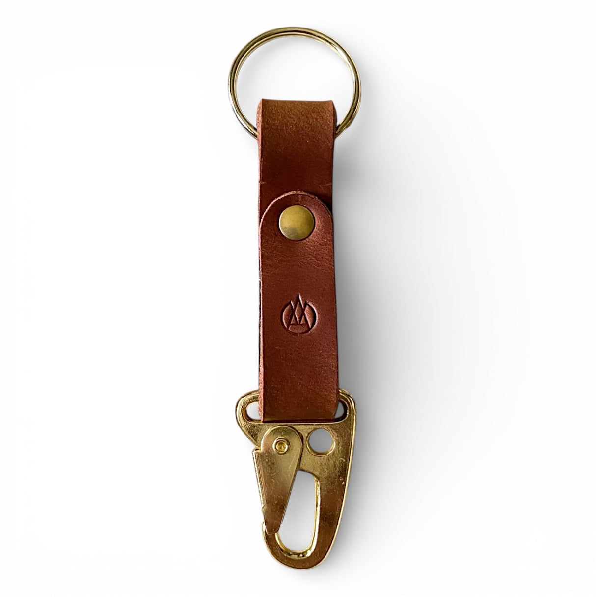 handmade leather lever snap keychain with brass hardware and pull-up leather detail
