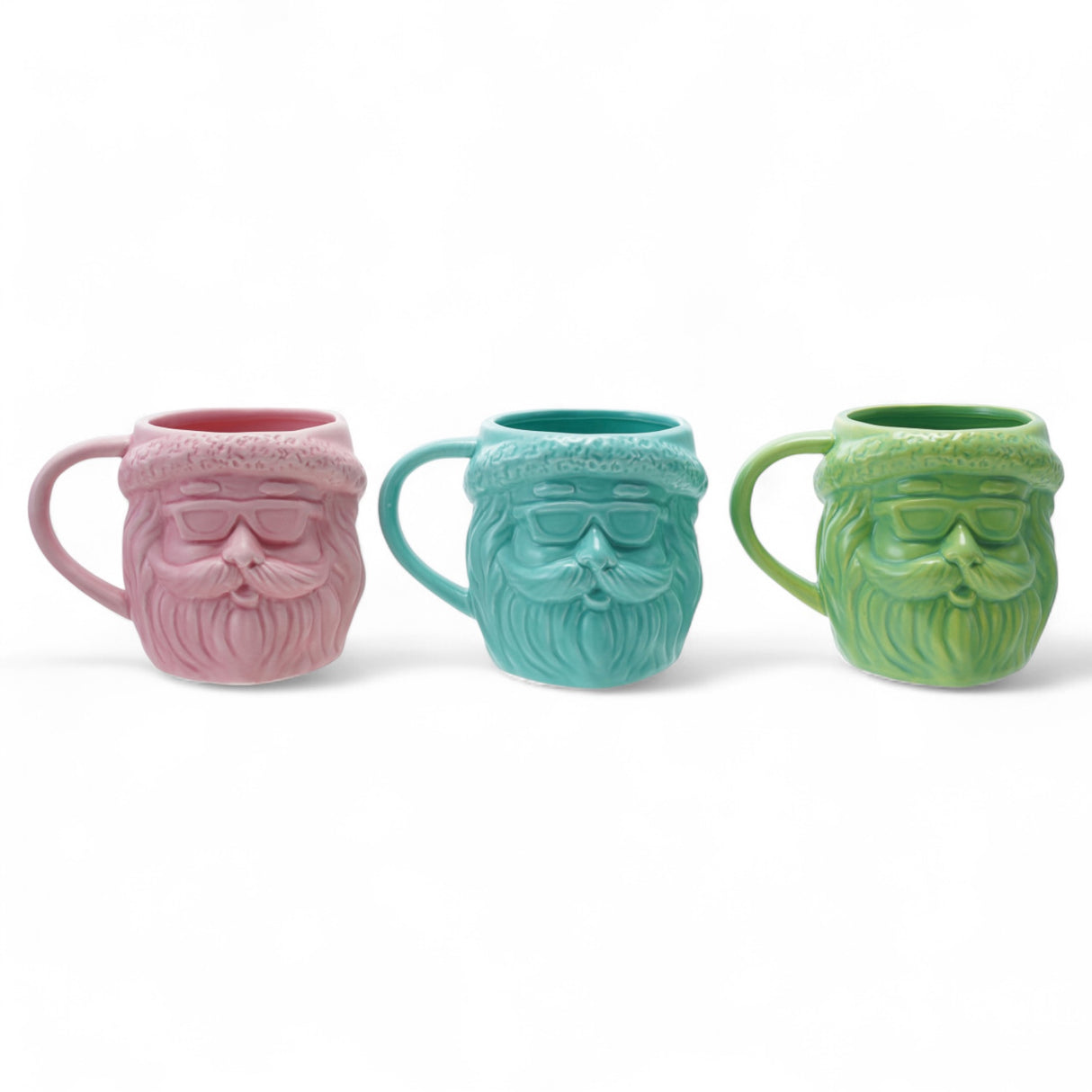 Three matte stoneware Santa head mugs in pink, blue, and green, 18-ounce capacity