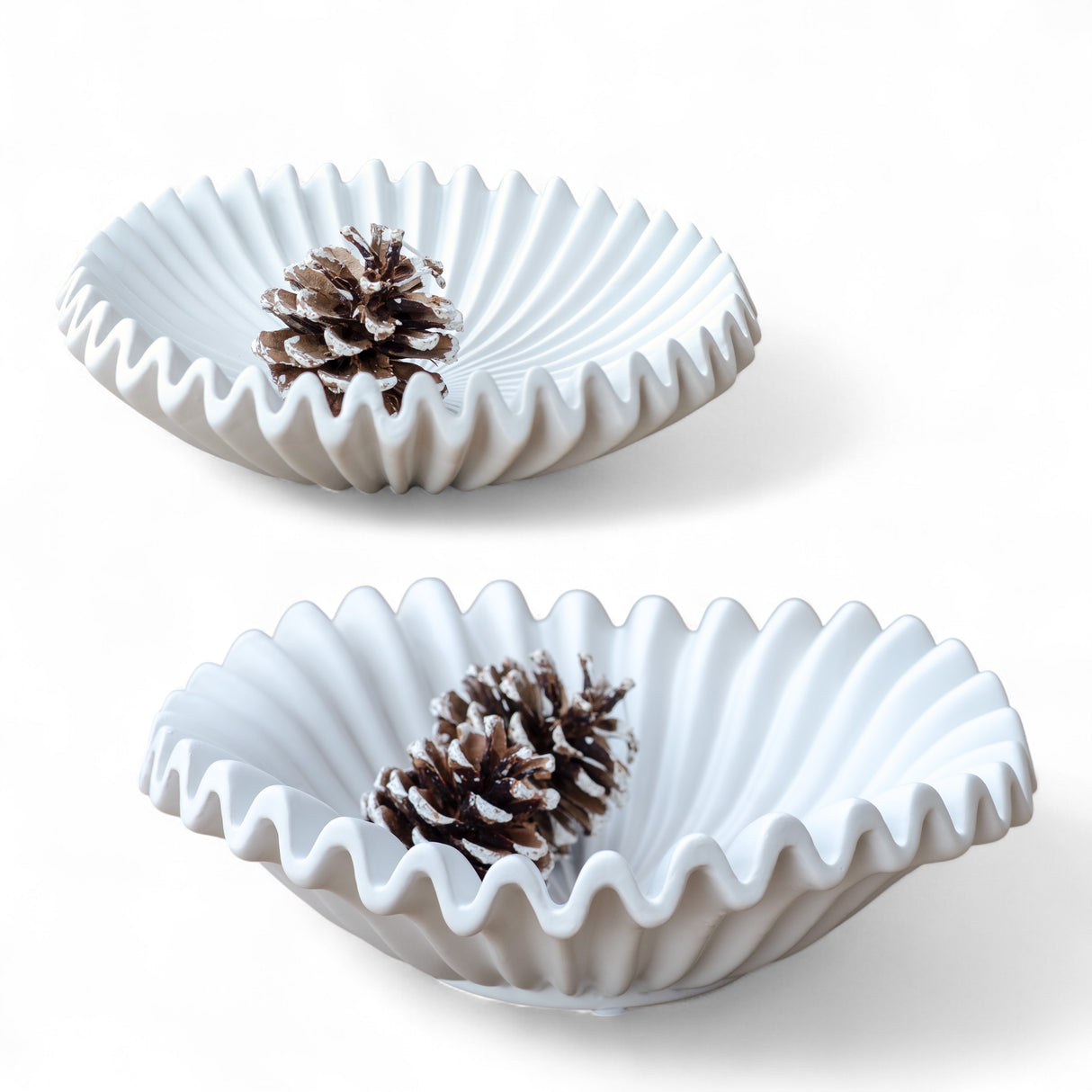Matte white ceramic decorative bowl with ripple edge