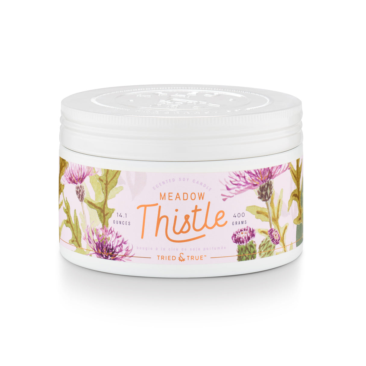 14.1 oz Meadow Thistle scented soy candle in a decorative floral tin with star jasmine, water lily, and amber fragrance