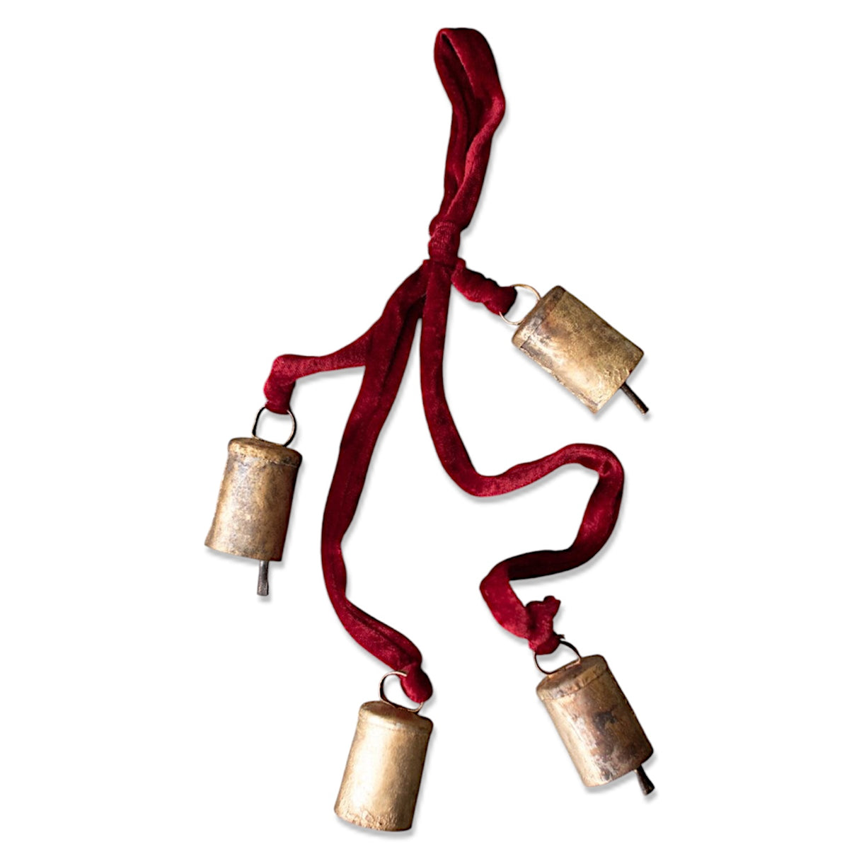 Vintage-style metal Christmas bell cluster with four bells on a velvet rope, measuring 25" long, ideal for holiday decor.