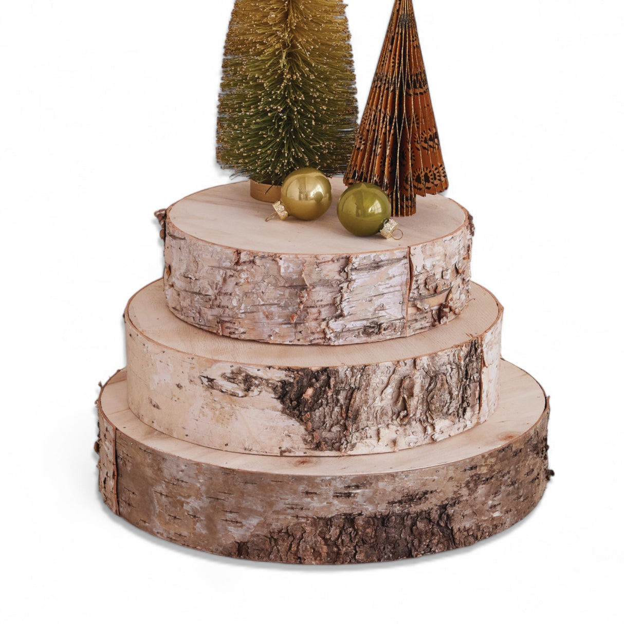 three natural birch wood slice display risers with bark edges
