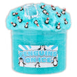Teal icee slime with penguin fimos, ice cube charms, and snowflake topper in clear container