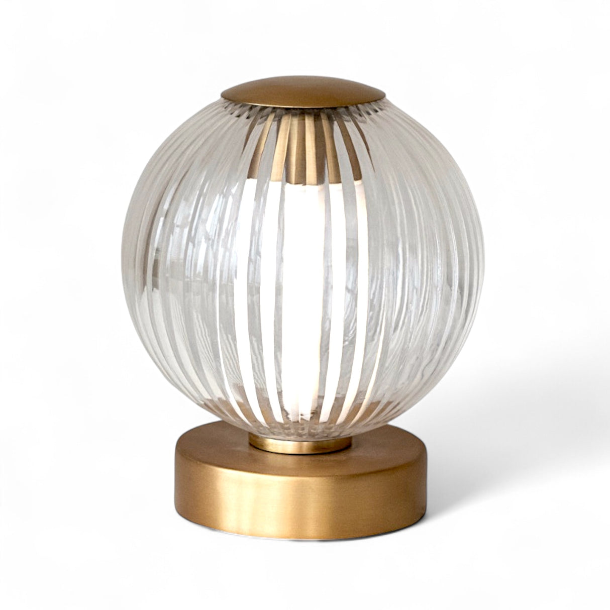 Pleated glass and antique brass LED touch lamp with rechargeable battery, 5 inches round by 6 inches high.