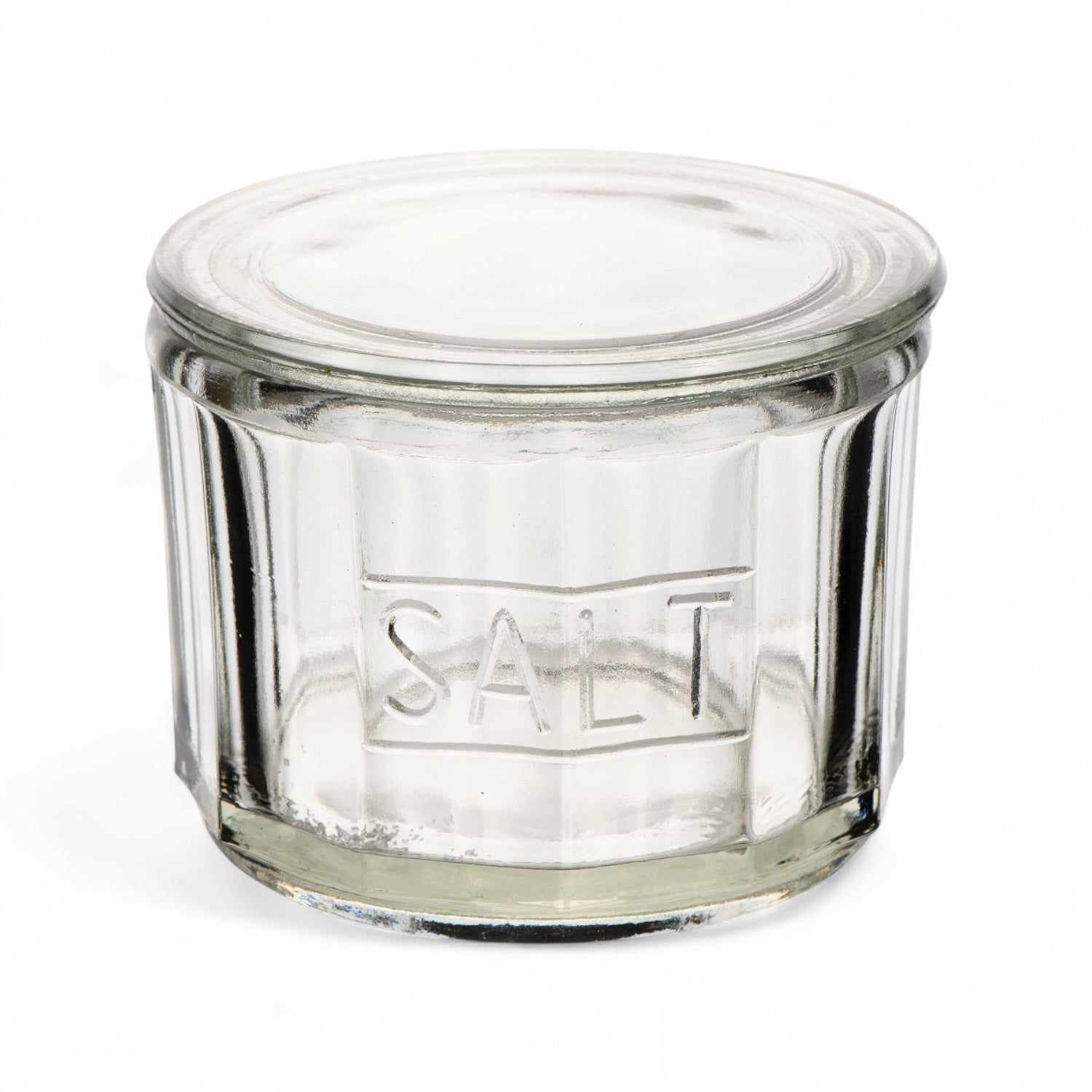 Clear pressed glass salt cellar with lid and embossed SALT lettering, 4.5 by 3.5 inches