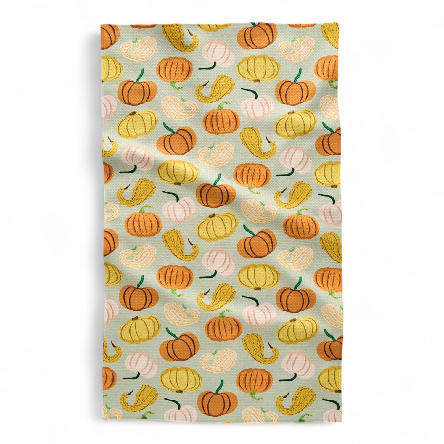 Patterned fabric with pumpkins and gourds tea towel