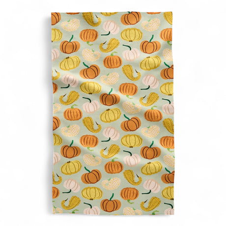 Patterned fabric with pumpkins and gourds tea towel
