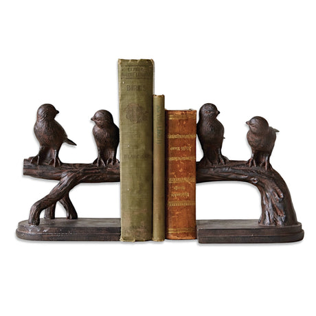 Set of resin bookends with birds on branches in rust finish