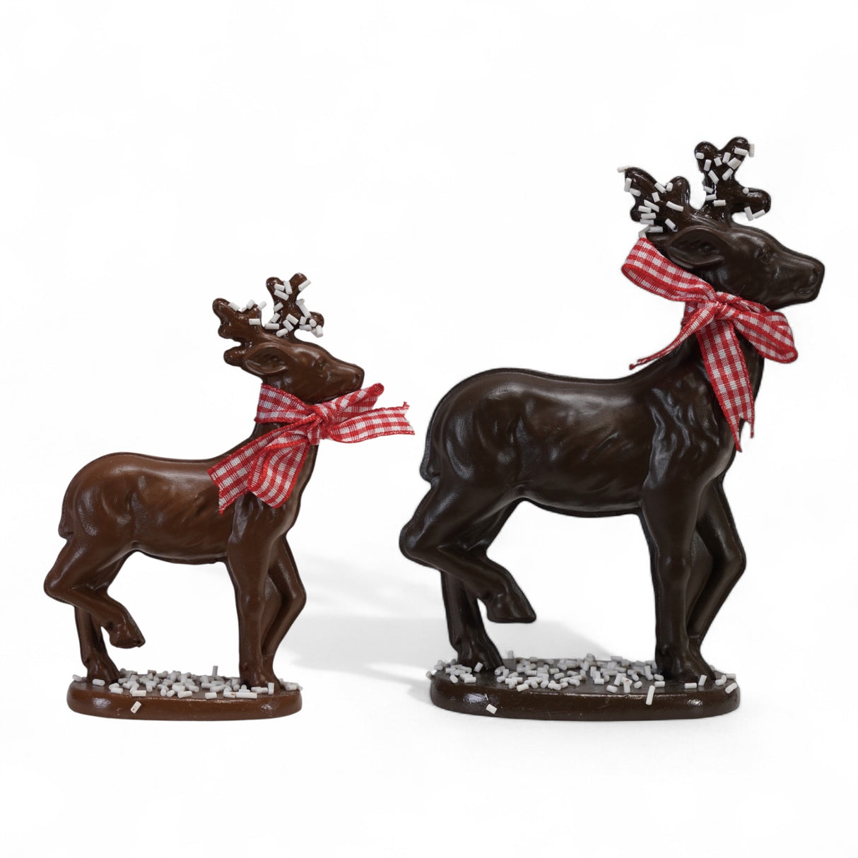 Resin milk and dark chocolate deer figurines with gingham bow and sprinkles