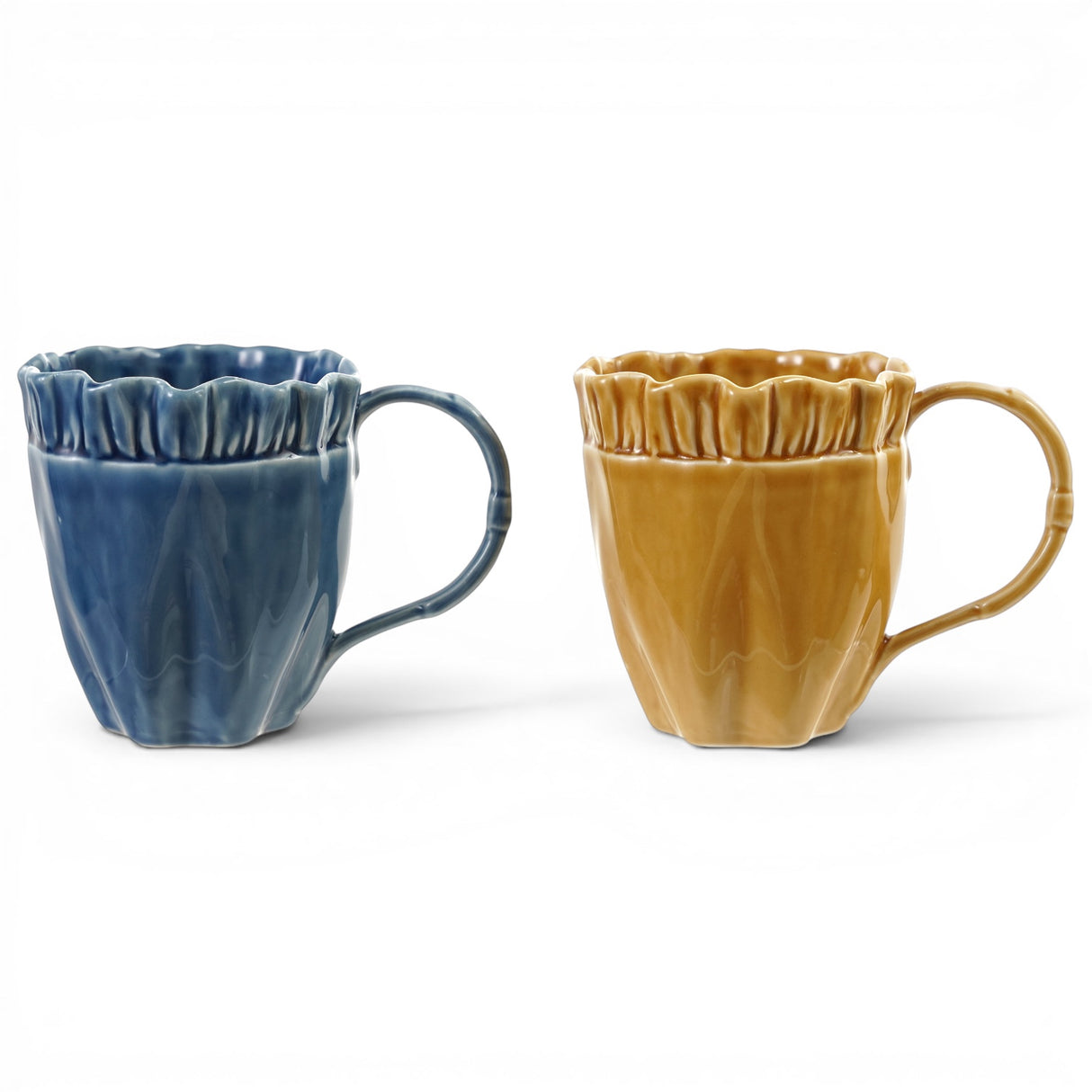 Ruffled edge ceramic coffee mugs in blue and mustard yellow with glossy textured finish