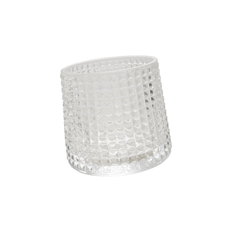Embossed clear spinning whiskey glass with textured design