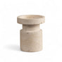 5.25-inch natural stone candle stand with round top and cylindrical base, shown with pillar candle