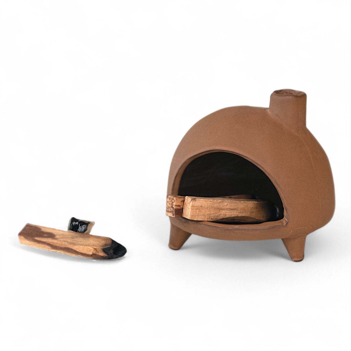 Stoneware incense chimney with terra-cotta reactive glaze and footed base