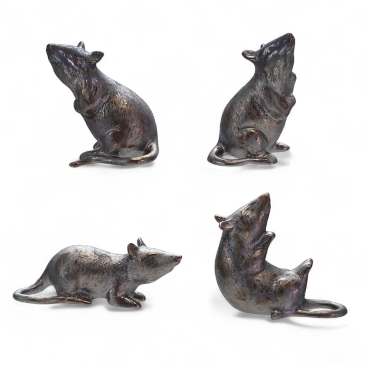 Stoneware rat figurine with reactive metallic glaze
