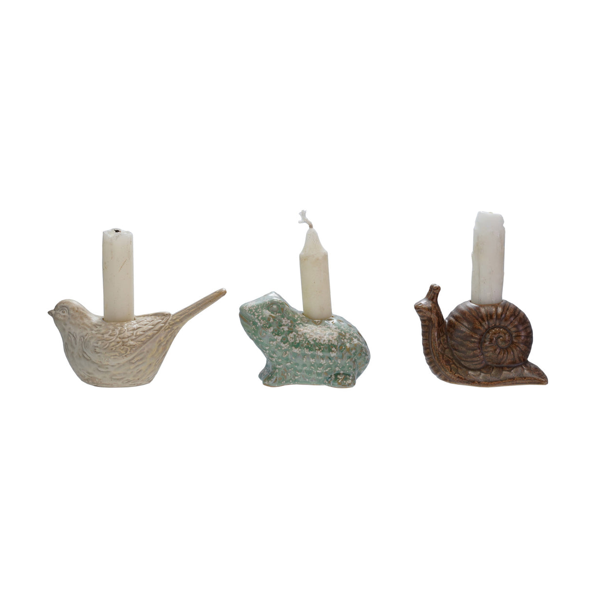 Set of three stoneware animal-shaped taper holders with reactive glaze, featuring bird, snail, and frog designs.