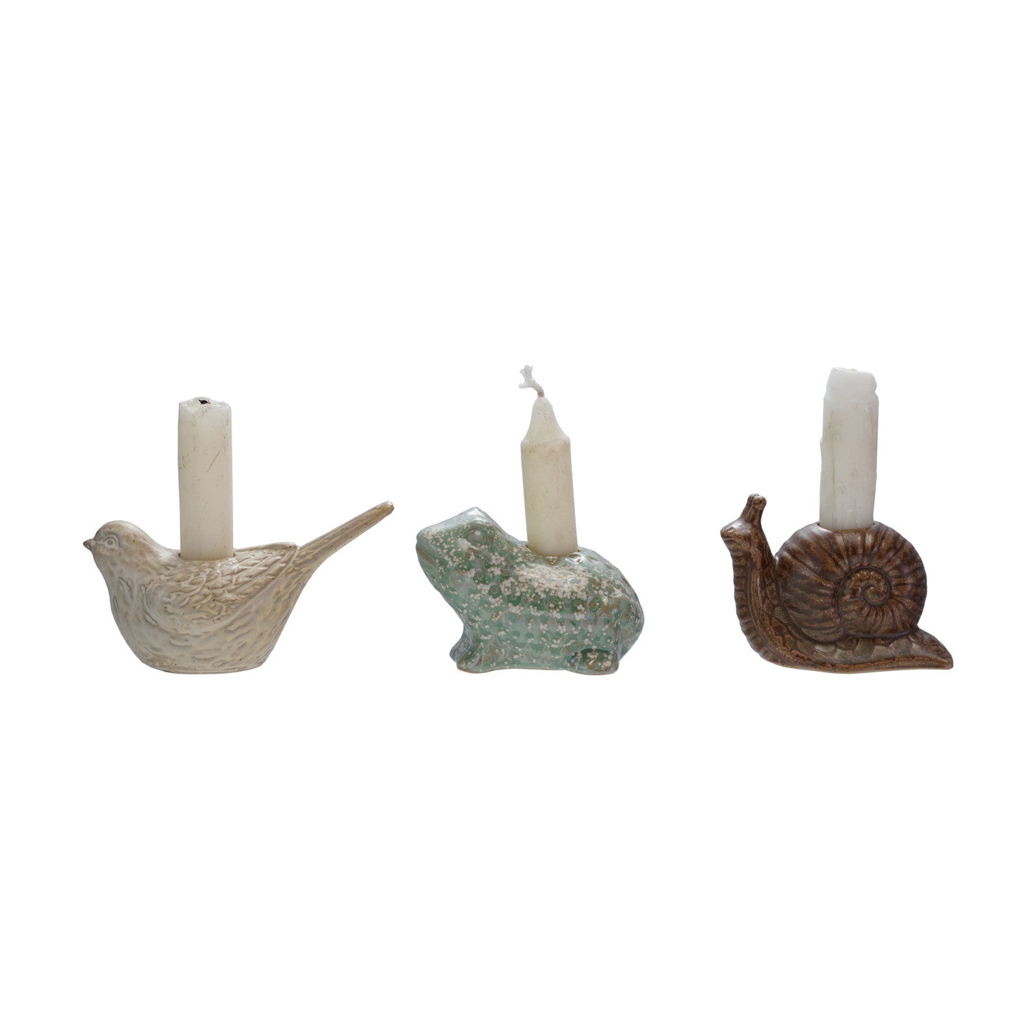 Set of three stoneware animal-shaped taper holders with reactive glaze, featuring bird, snail, and frog designs.