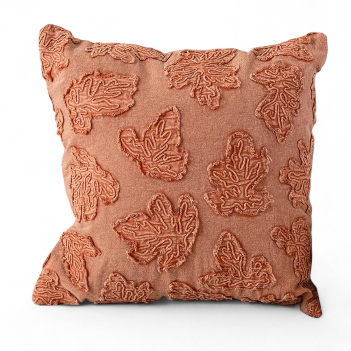18-inch rust colored stonewashed pillow with textured fall leaf pattern