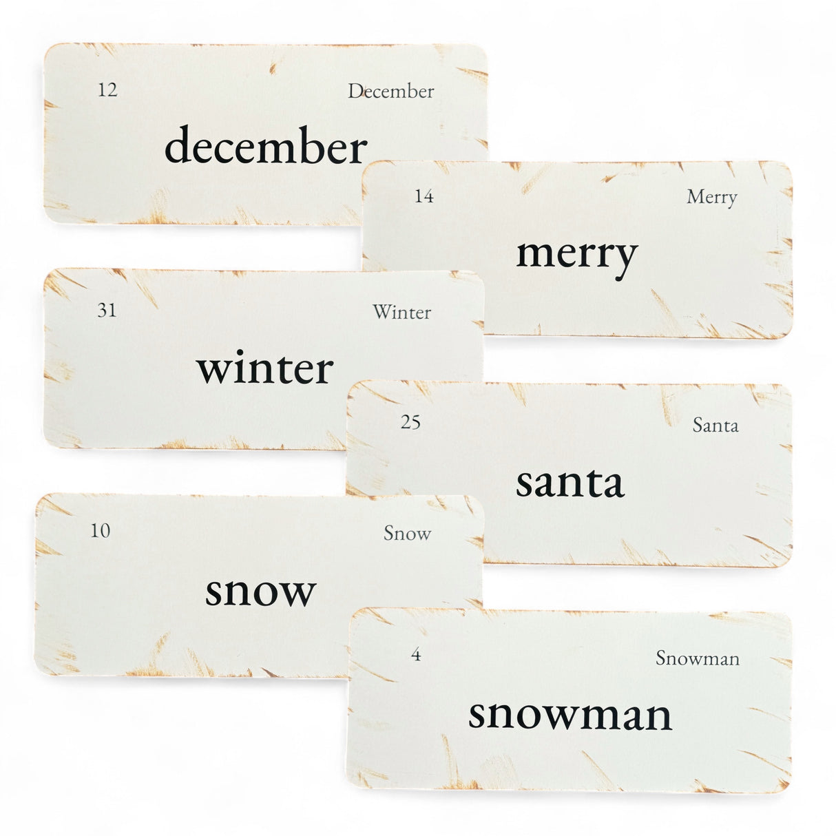 Set of Christmas-themed flashcards with text on a white background