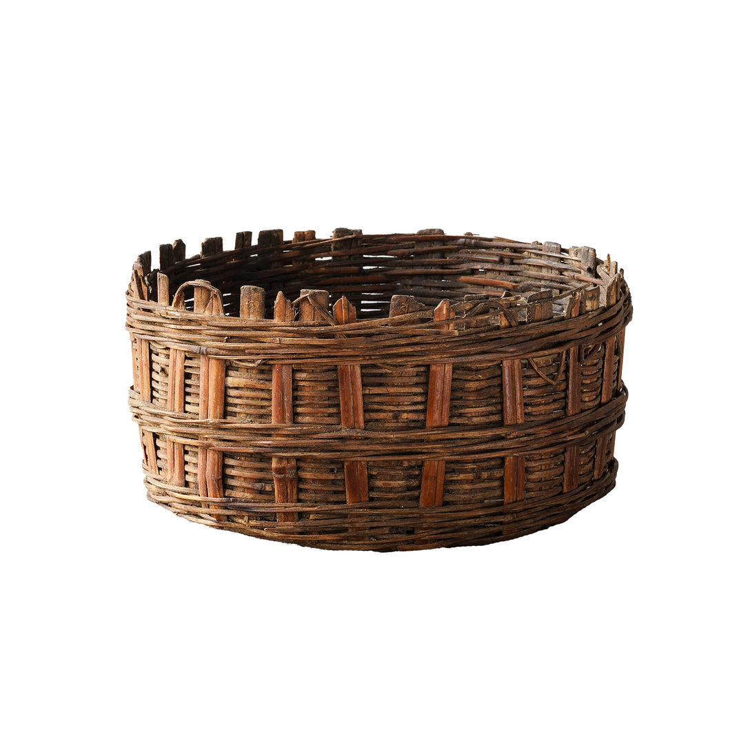 Vintage Himachal basket, handwoven from rattan, measuring approximately 10" x 17", ideal for storage, planters, or decorative use.