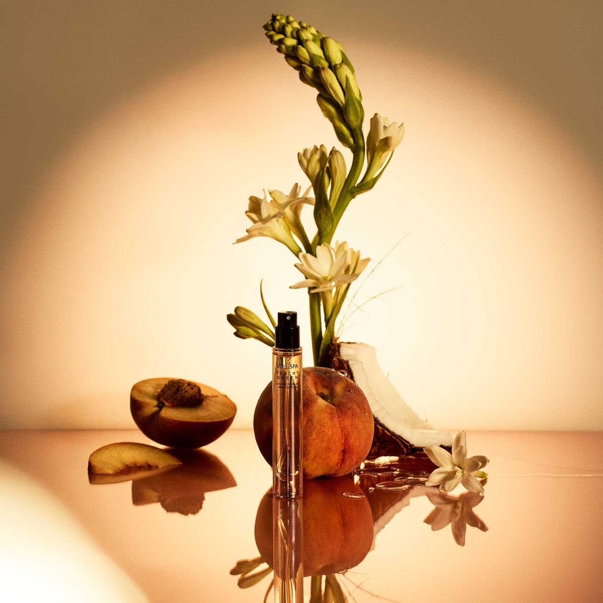 Peachy Queen 10 mL perfume with golden peach tuberose coconut water citrus musk and vanilla notes
