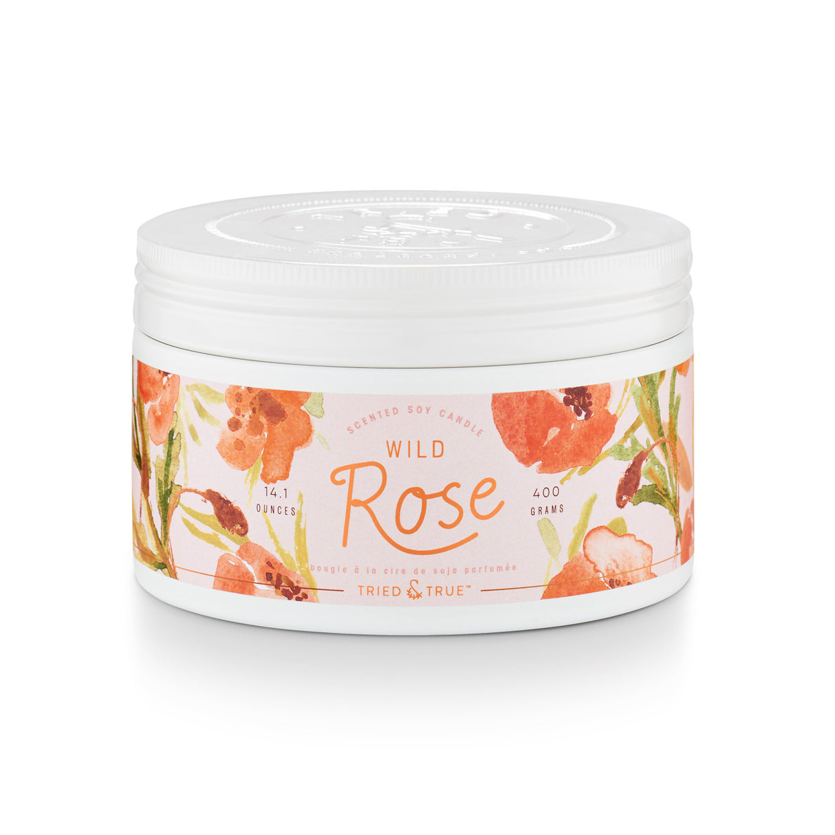 14.1 oz Wild Rose scented soy candle in a floral-wrapped tin with embossed lid, featuring notes of red currant, magnolia, and violet.