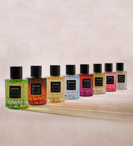 Voluspa eau de parfum collection featuring full-size perfume bottles and travel sprays