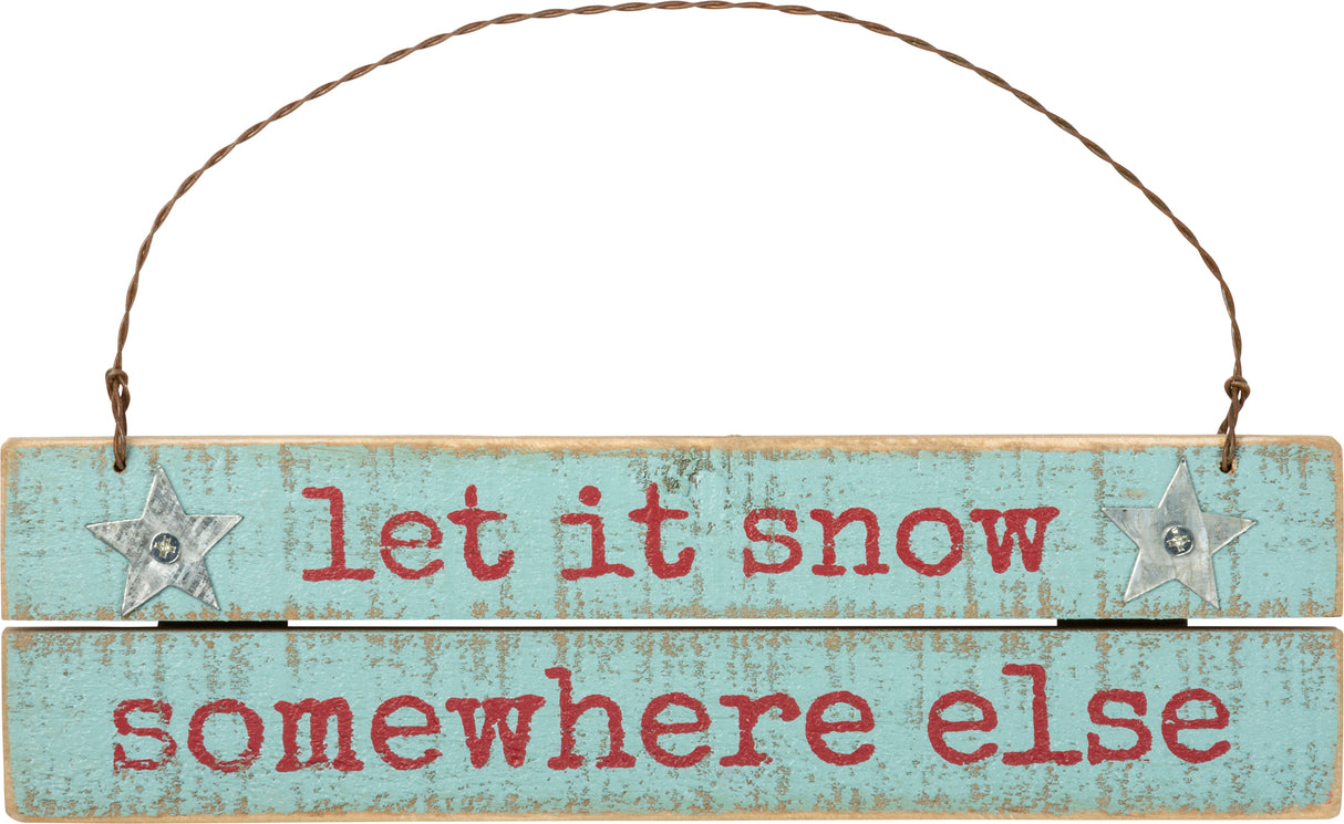 let it snow somewhere else wood sign