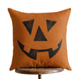 Handmade 18-inch burnt orange Halloween pillow with a black jack-o’-lantern face, white back, and included insert