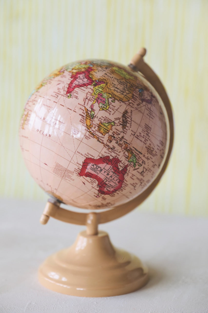 Vintage-Inspired Pink Globe on Metal Stand