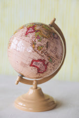 Vintage-Inspired Pink Globe on Metal Stand