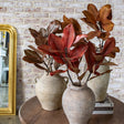 44-inch faux magnolia leaf stems in assorted brown and red fall colors
