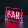 LED neon sign that says BAR in red lettering by creative co-op