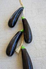 String of Artificial Eggplants