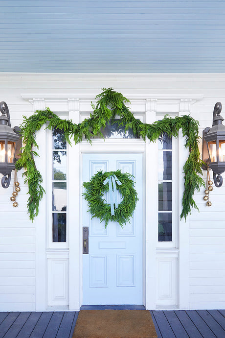 real touch norfolk pine wreath on front door