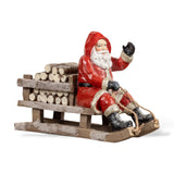 Red Sledding Resin Santa with Firewood